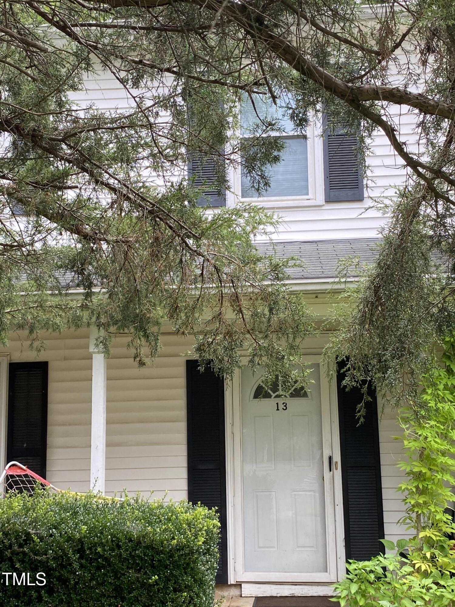 13 Providence Court Durham, NC 27705 - Photo 2 of 5 a yellow house with outdoor space
