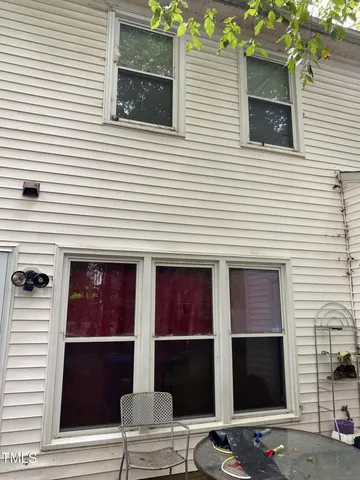 a view of a house with two windows