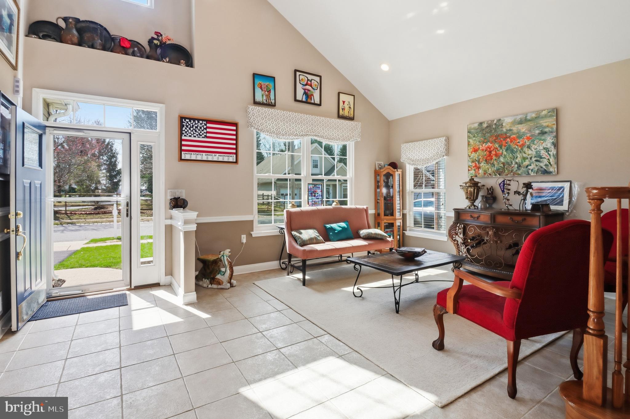 12 Cardinal Flower Lane Princeton Junction, NJ 08550 - Photo 15 of 62 a living room with furniture and a floor to ceiling window