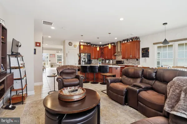 a bedroom with a bed and a mirror