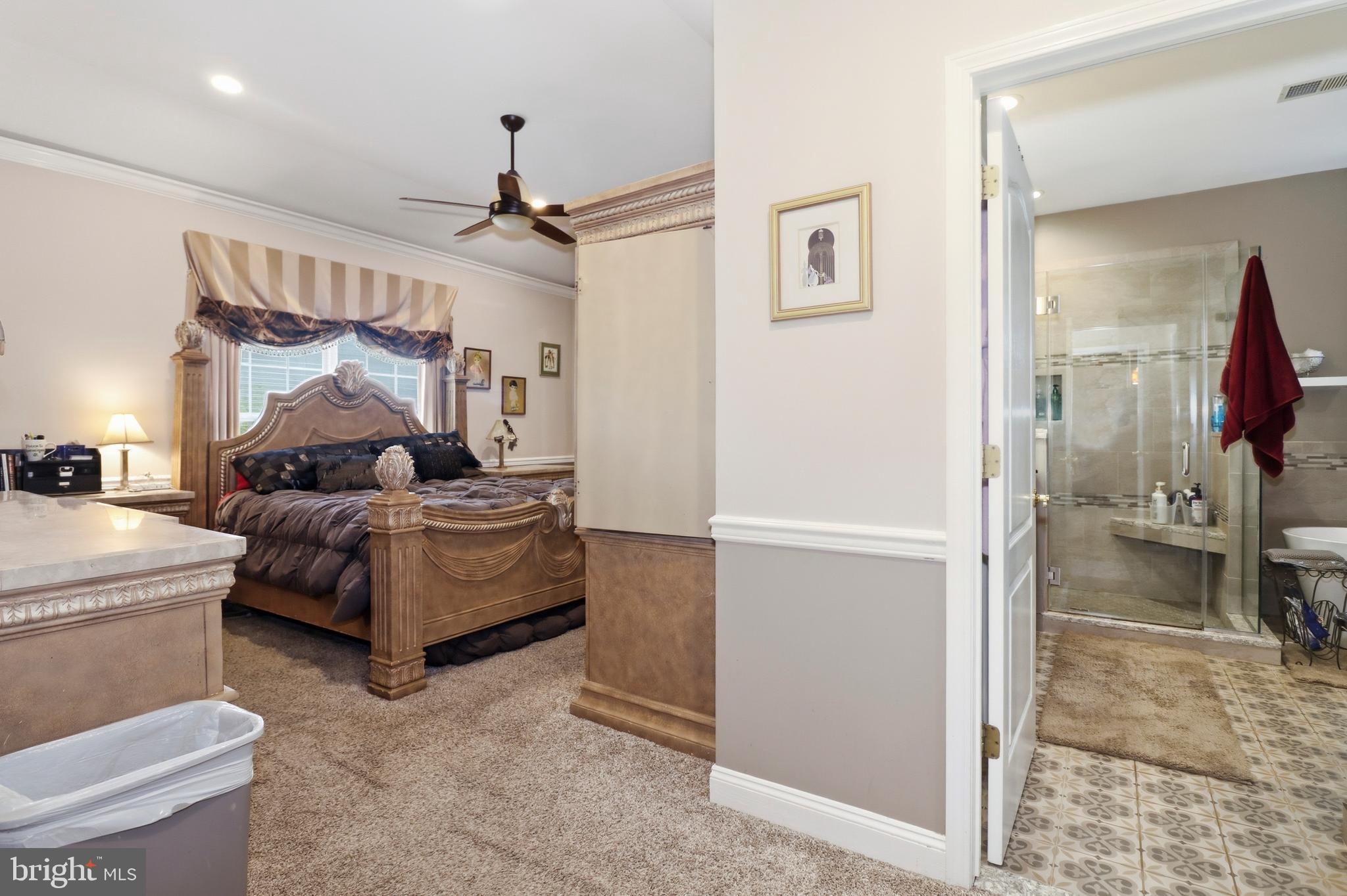 12 Cardinal Flower Lane Princeton Junction, NJ 08550 - Photo 25 of 62 a bedroom with a bed and a mirror