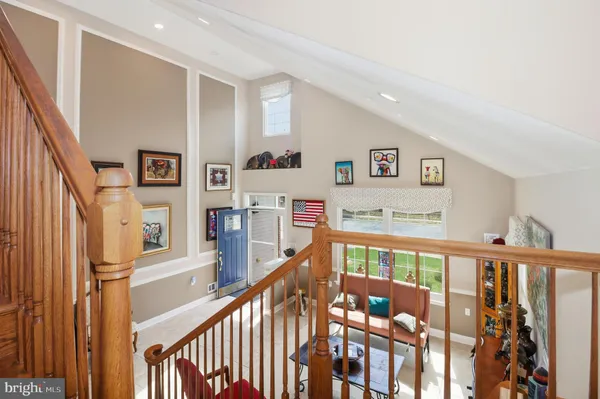 a bedroom with a bed and a desk