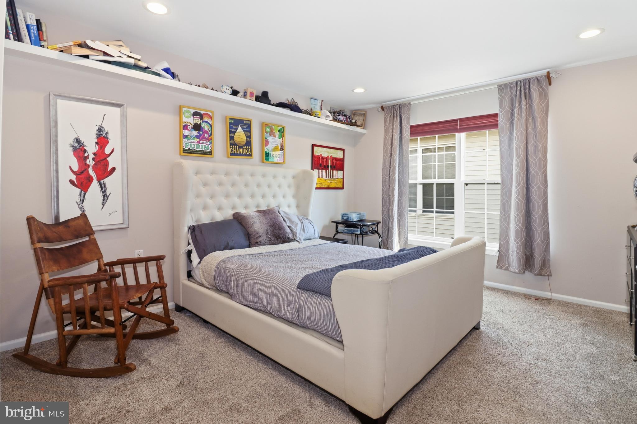 12 Cardinal Flower Lane Princeton Junction, NJ 08550 - Photo 39 of 62 a bed room with a bed and a chair