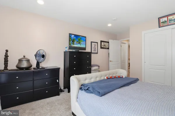 a garden with trees in the background