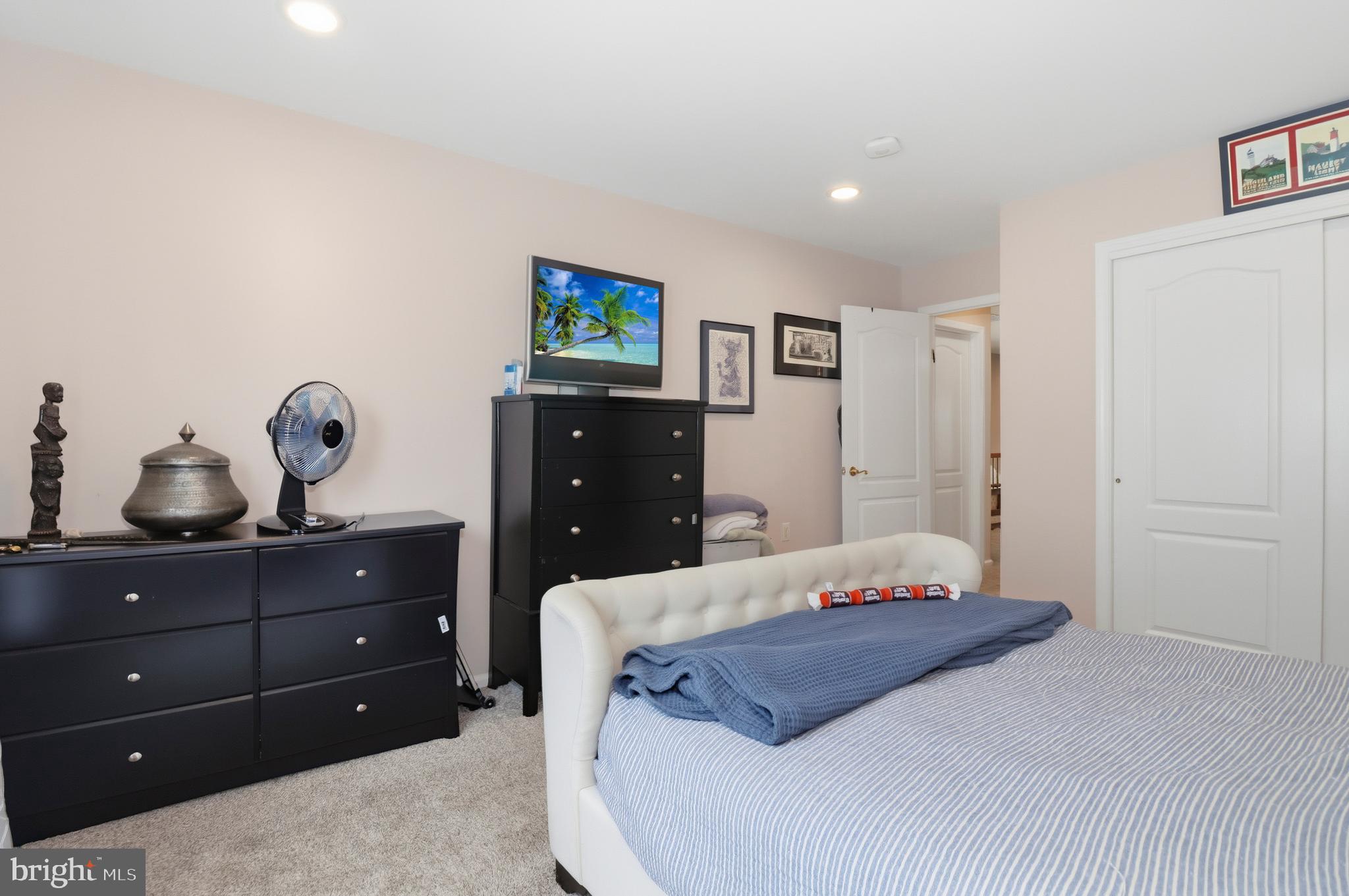 12 Cardinal Flower Lane Princeton Junction, NJ 08550 - Photo 41 of 62 a bedroom with a bed and a dresser