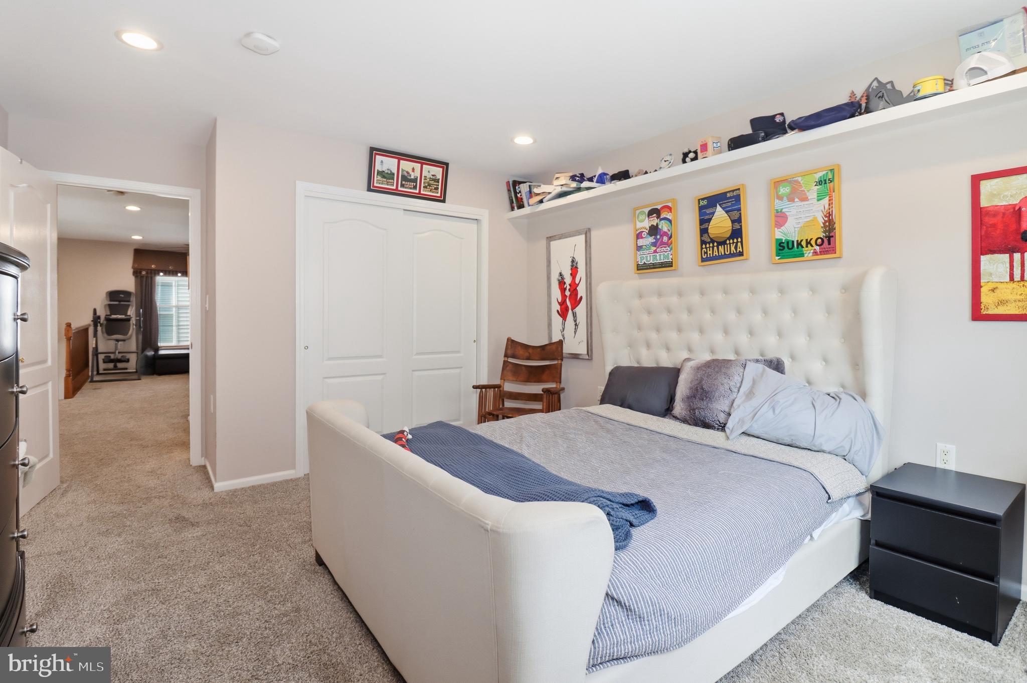 12 Cardinal Flower Lane Princeton Junction, NJ 08550 - Photo 42 of 62 a bed room with a bed and a couch