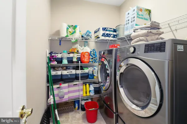 a view of a livingroom with furniture and a table