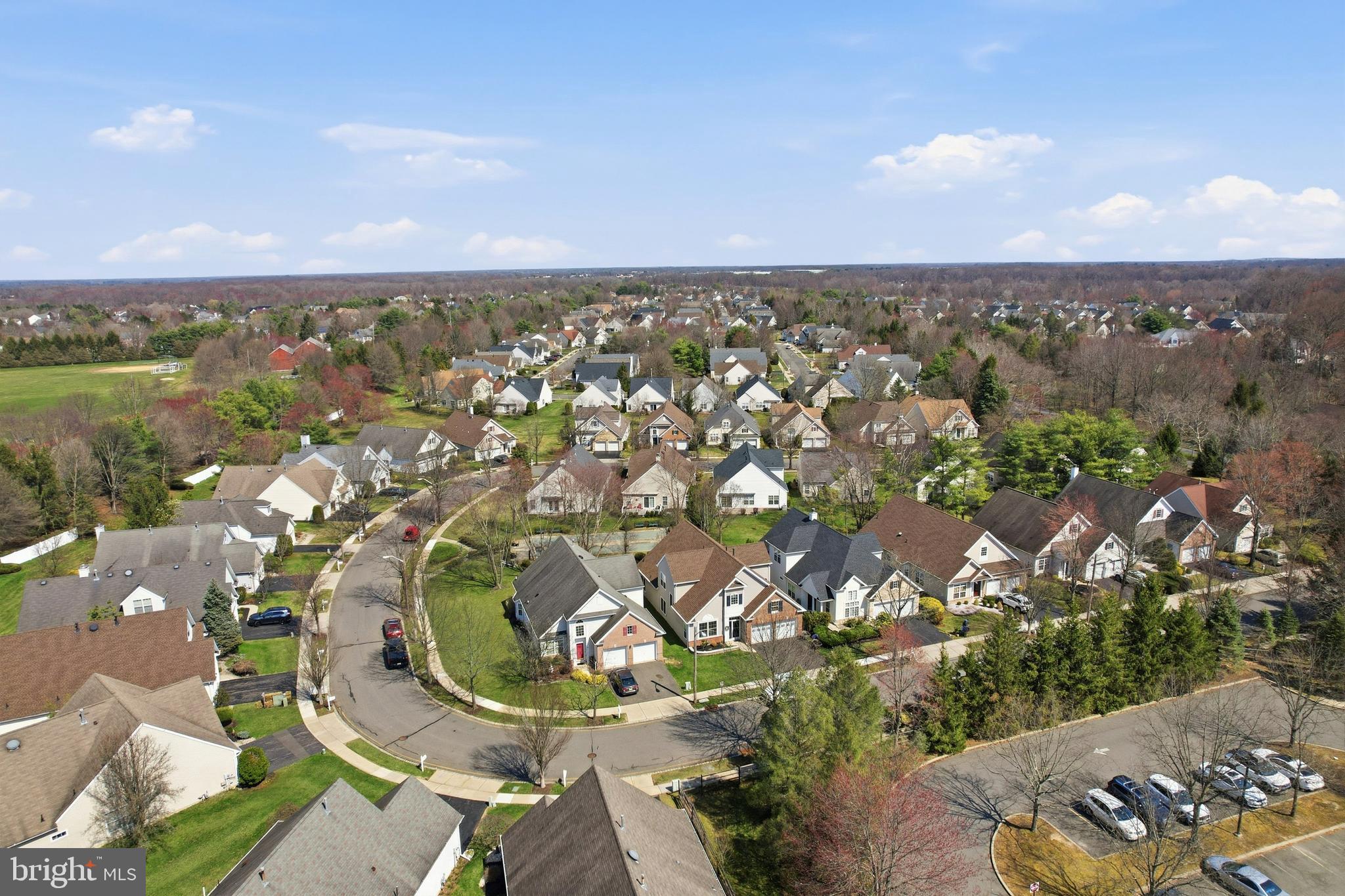 12 Cardinal Flower Lane Princeton Junction, NJ 08550 - Photo 5 of 62 an aerial view of a houses with a lake
