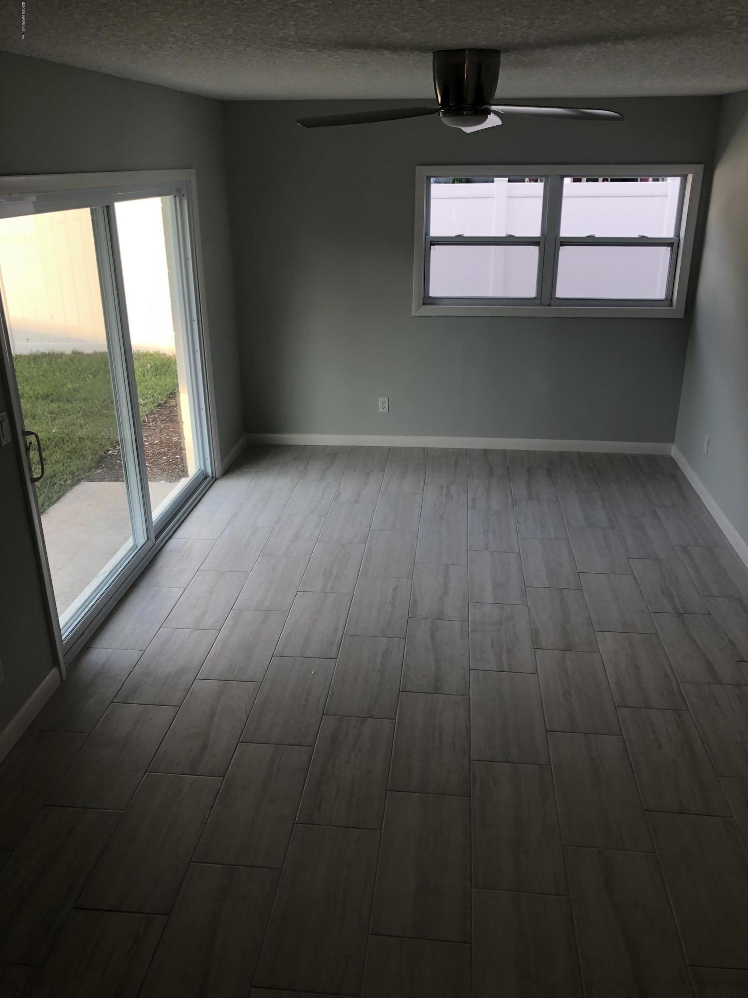 240 Hopkins Street Neptune Beach, FL 32266 - Photo 4 of 26 IMG_2494