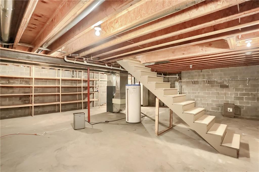 169 North Stone Base Road Mercer, PA 16137 - Photo 17 of 23 Full Basement with stairs to yard with bilco door