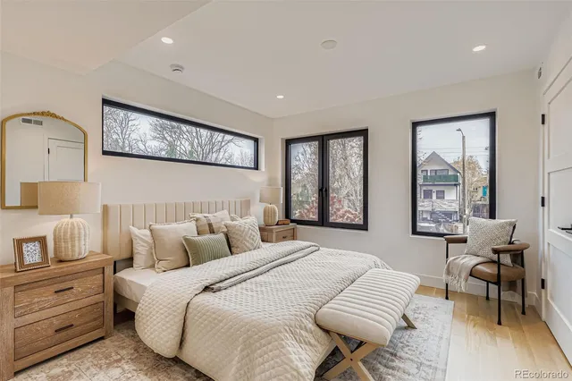a bedroom with bed and window