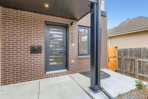 a view of a door and a street