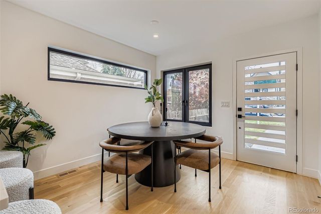 a view of a livingroom with furniture and window