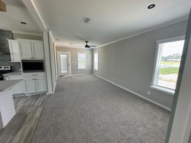 202 Skipjack Lane Freeport, FL 32439 - Photo 5 of 10 a view of a kitchen with furniture and a window