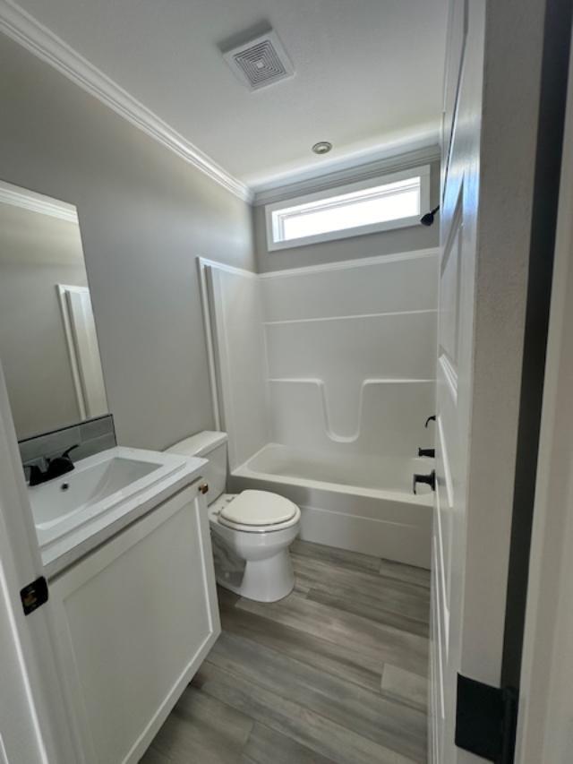 202 Skipjack Lane Freeport, FL 32439 - Photo 8 of 10 a bathroom with a toilet and a shower