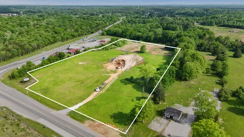 an aerial view of a tennis court