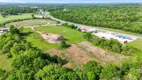 a view of a lake with a big yard