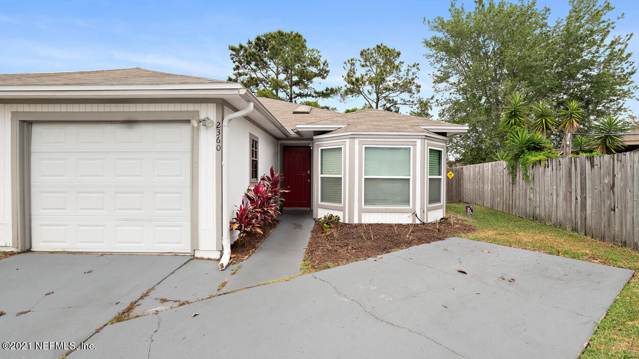 2360 Bitternut Way Jacksonville, FL 32246 - Photo 2 of 26 a house with a outdoor space