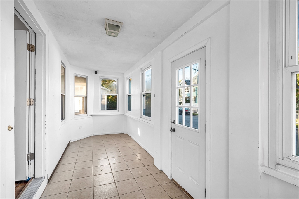 29 Wareham Street Springfield, MA 01108 - Photo 15 of 38 a view of an empty room with a window