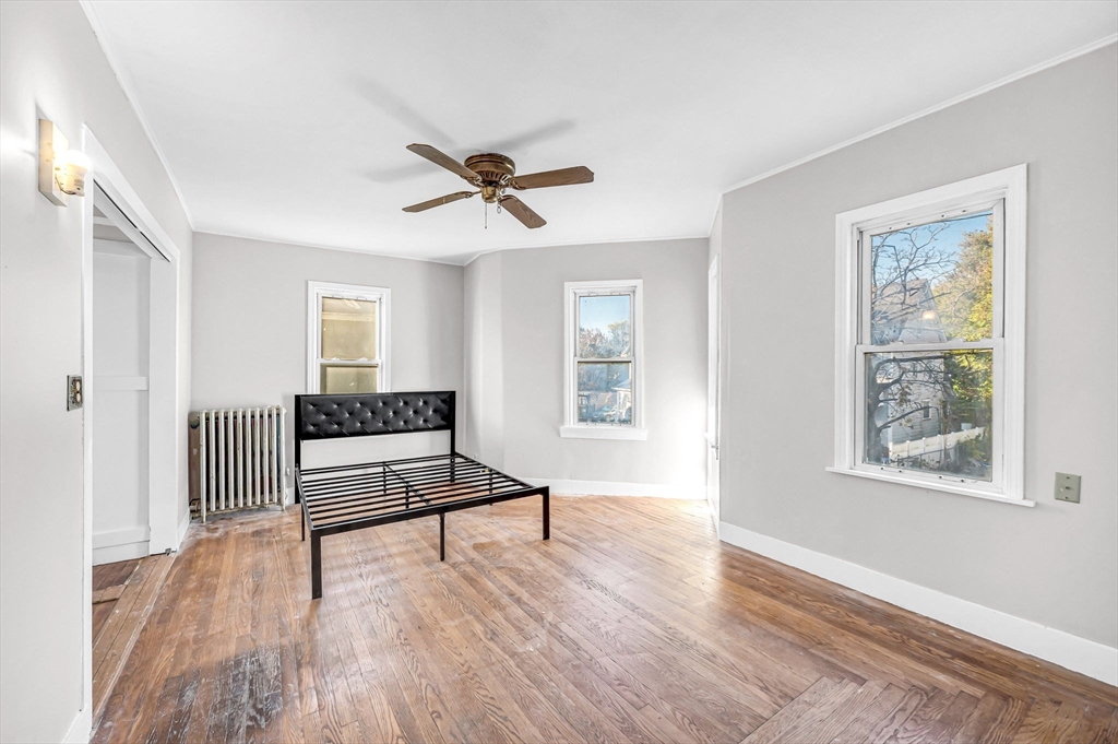 29 Wareham Street Springfield, MA 01108 - Photo 17 of 38 a living room with furniture and a window