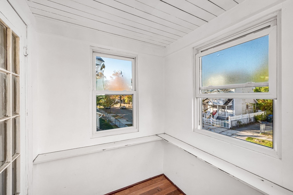29 Wareham Street Springfield, MA 01108 - Photo 24 of 38 a view of a hallway with window and dining room