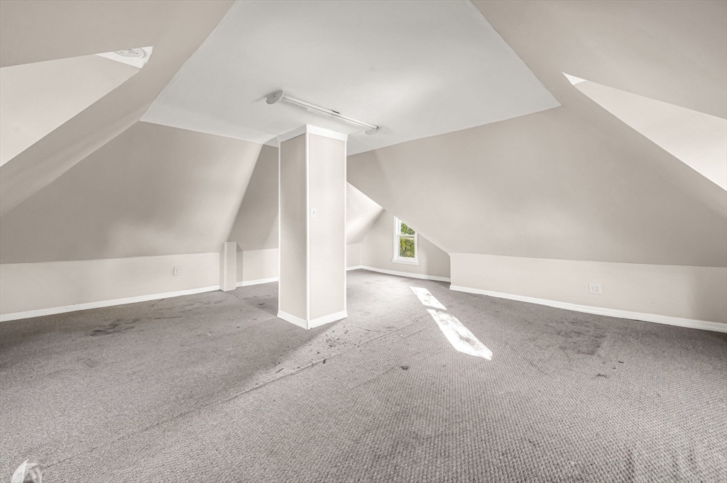 29 Wareham Street Springfield, MA 01108 - Photo 25 of 38 a view of a big room with closet and windows
