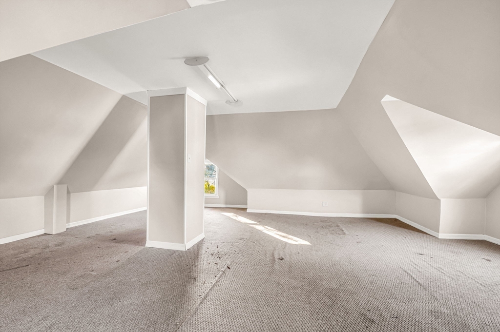29 Wareham Street Springfield, MA 01108 - Photo 27 of 38 a view of an empty room with stairs