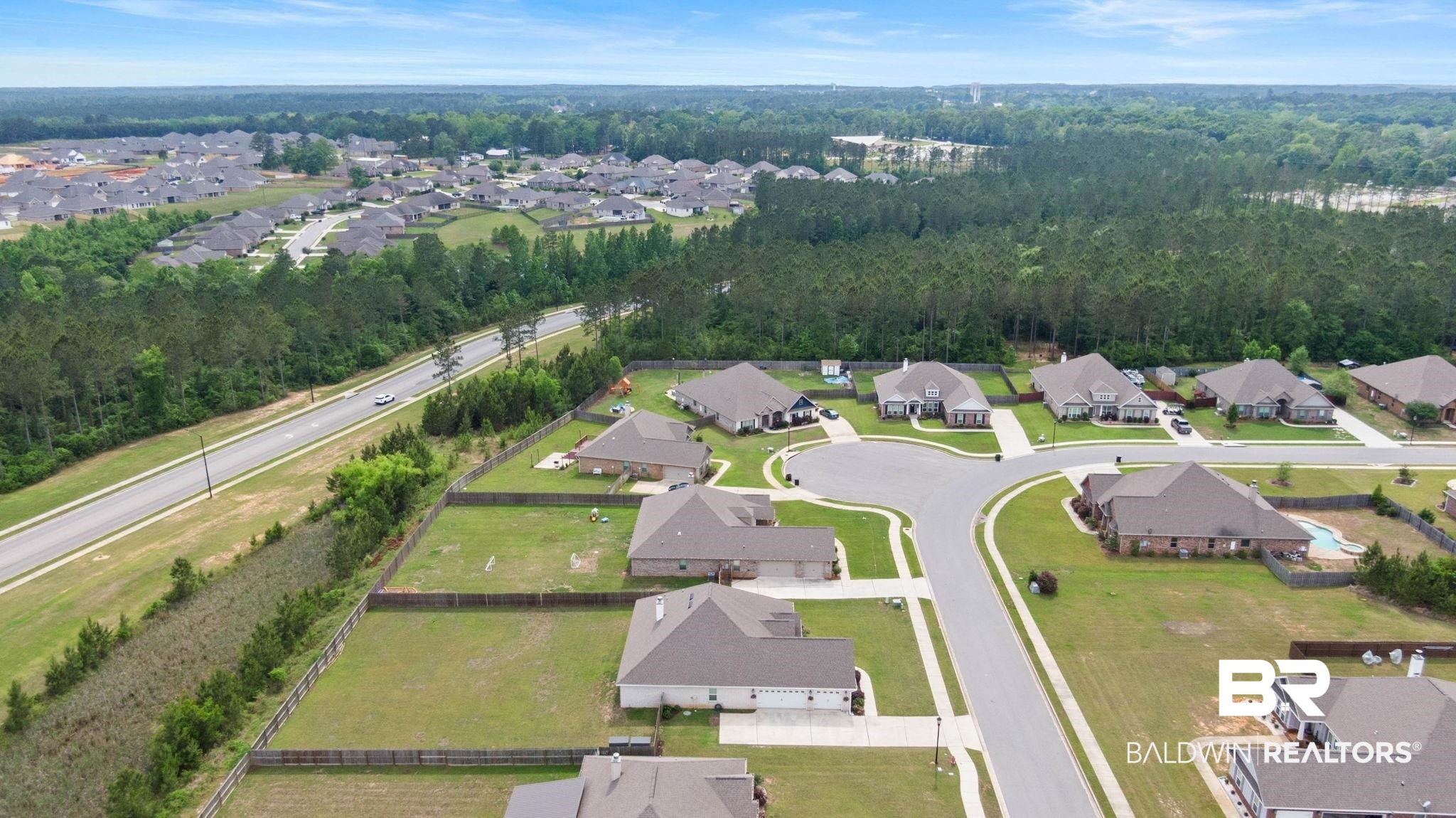 31187 Spoonbill Road Daphne, AL 36527 - Photo 81 of 85 Aerial perspective showcasing a residential community with mature trees