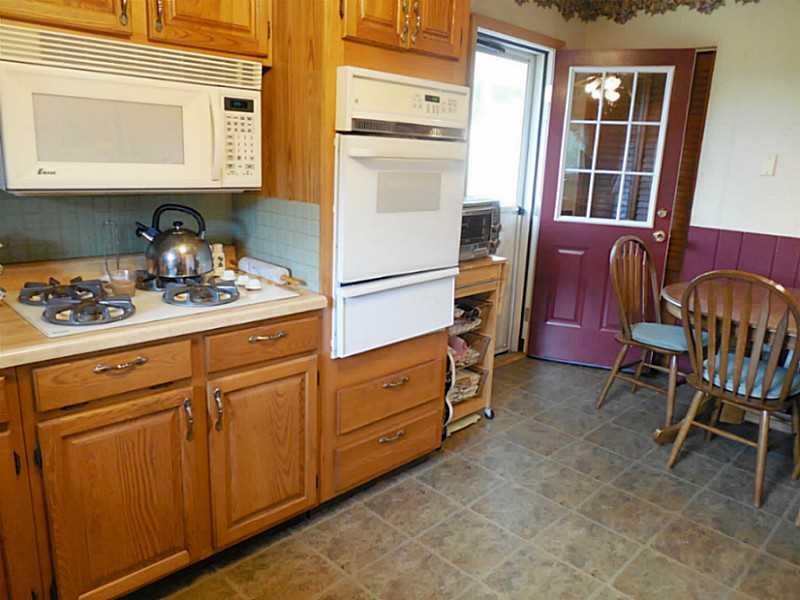 124 Mill Hill Road Elizabeth, PA 15037 - Photo 13 of 25 Kitchen. There is a covered porch off the kitchen which makes for a wonderful barbecuing area. There is also a huge pantry.