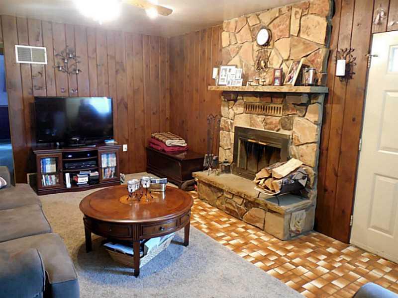124 Mill Hill Road Elizabeth, PA 15037 - Photo 15 of 25 Living Room. Nestle around the fireplace on those cold snowy evenings.