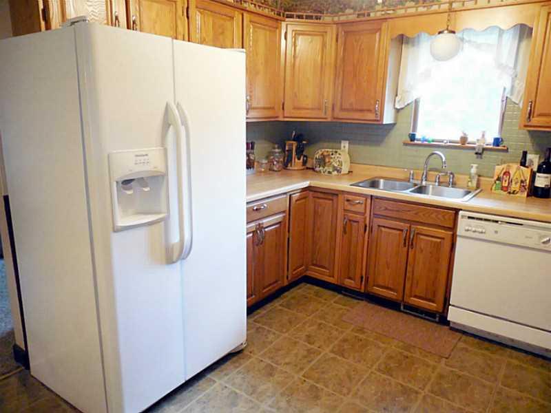 124 Mill Hill Road Elizabeth, PA 15037 - Photo 3 of 25 Kitchen. This fully equipped oak kitchen comes complete with side by side refrigerator, microwave, gas cook top, oven, dishwasher and large pantry.