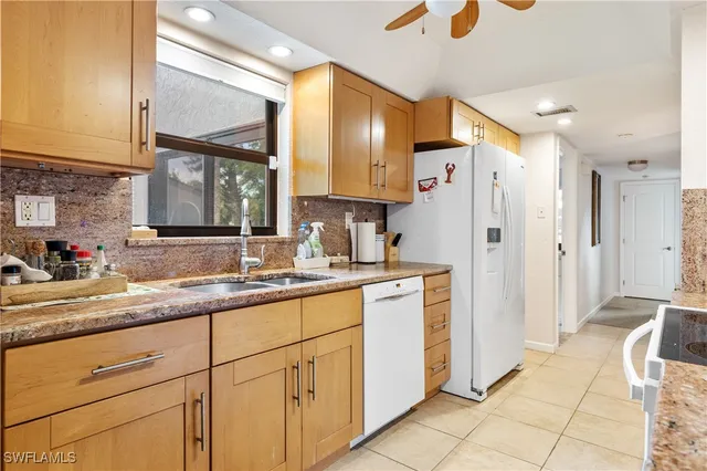 a bathroom with a sink a mirror and a shower