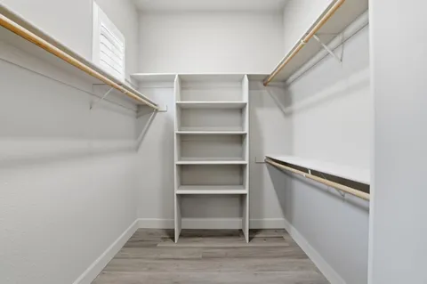 a bathroom with a sink a mirror and a bathtub