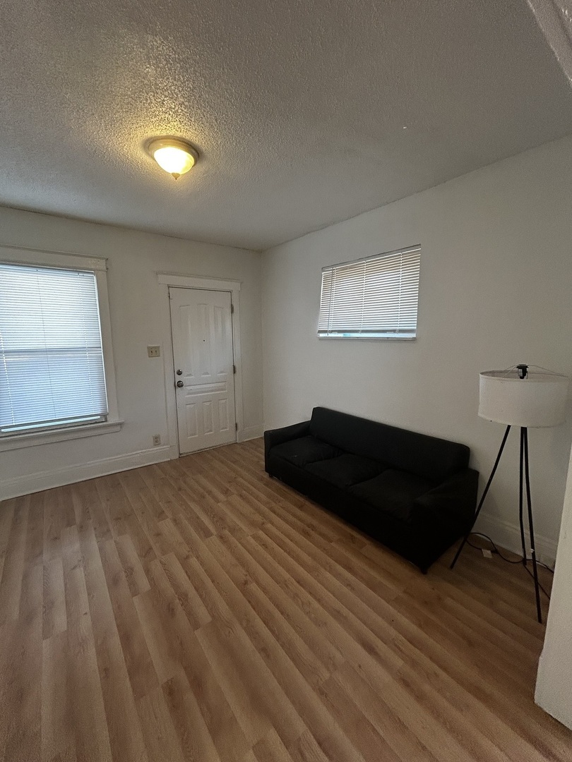 1041 West 104th Place Chicago, IL 60643 - Photo 11 of 19 a bedroom with a bed and a window