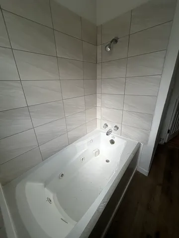 a bathroom with a bathtub