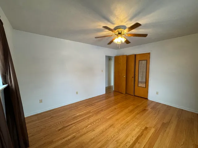 a view of an empty room with window