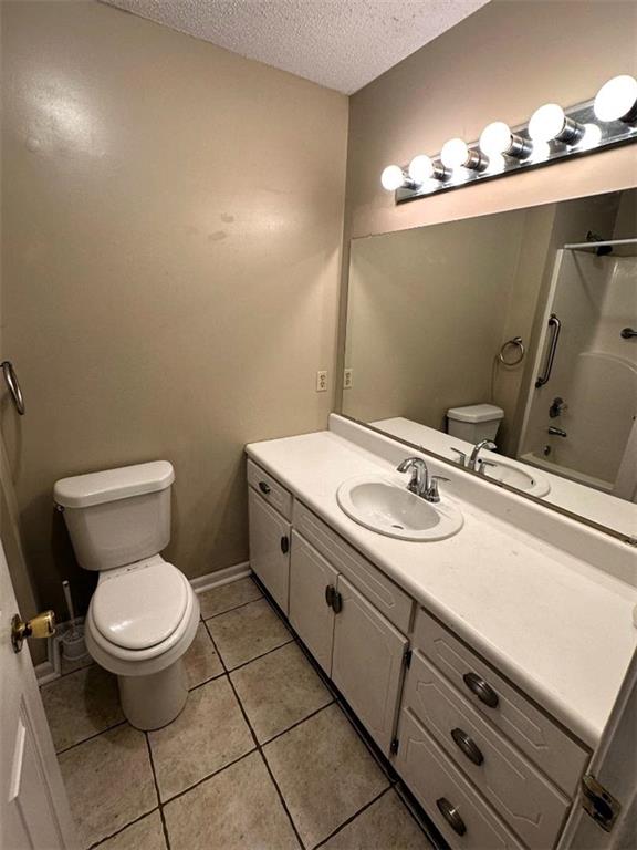 159 Guyton Road Northwest Sugar Valley, GA 30746 - Photo 12 of 12 a bathroom with a sink a toilet and a mirror