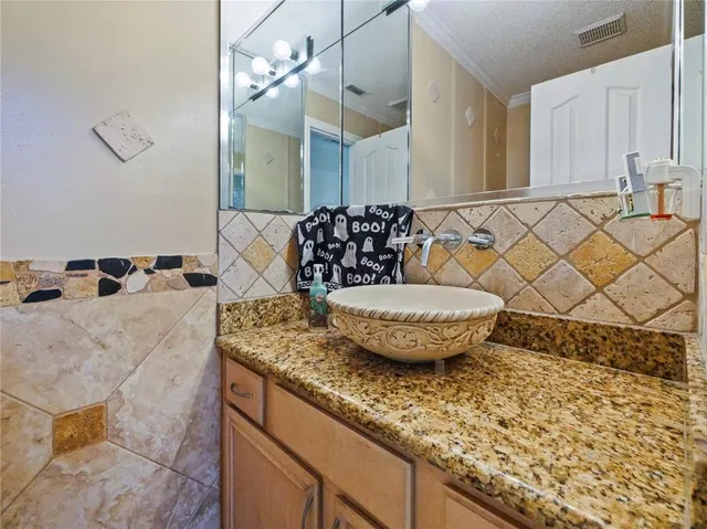 a view of yard with patio