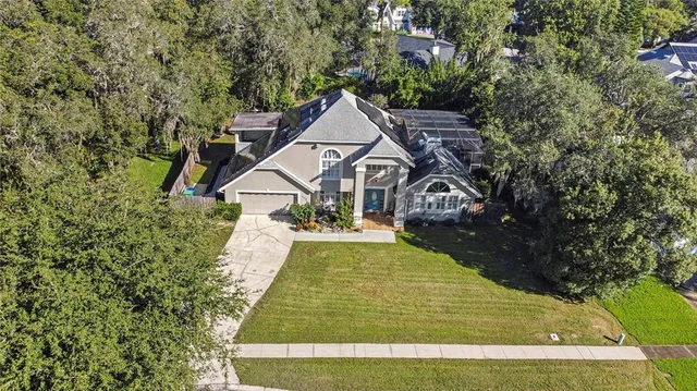 a view of a house with roof yard