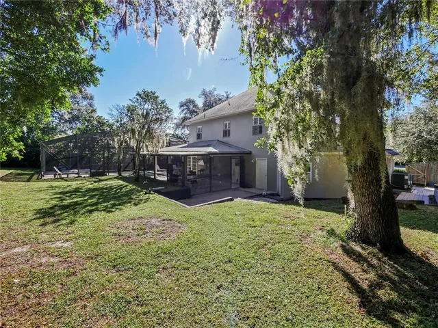 a view of a back yard of the house