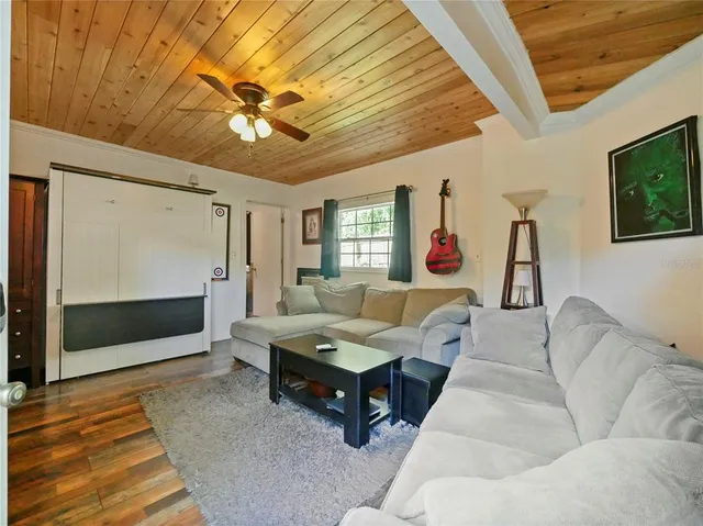 a bathroom with a sink vanity mirror and toilet
