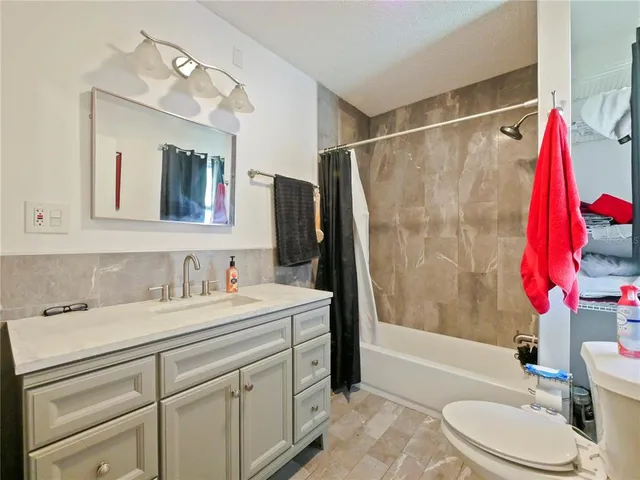 a view of a hallway with windows