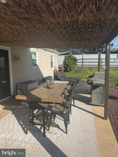 745 Tamarack Trail Reading, PA 19607 - Photo 3 of 10 a view of a patio with a table chairs and backyard