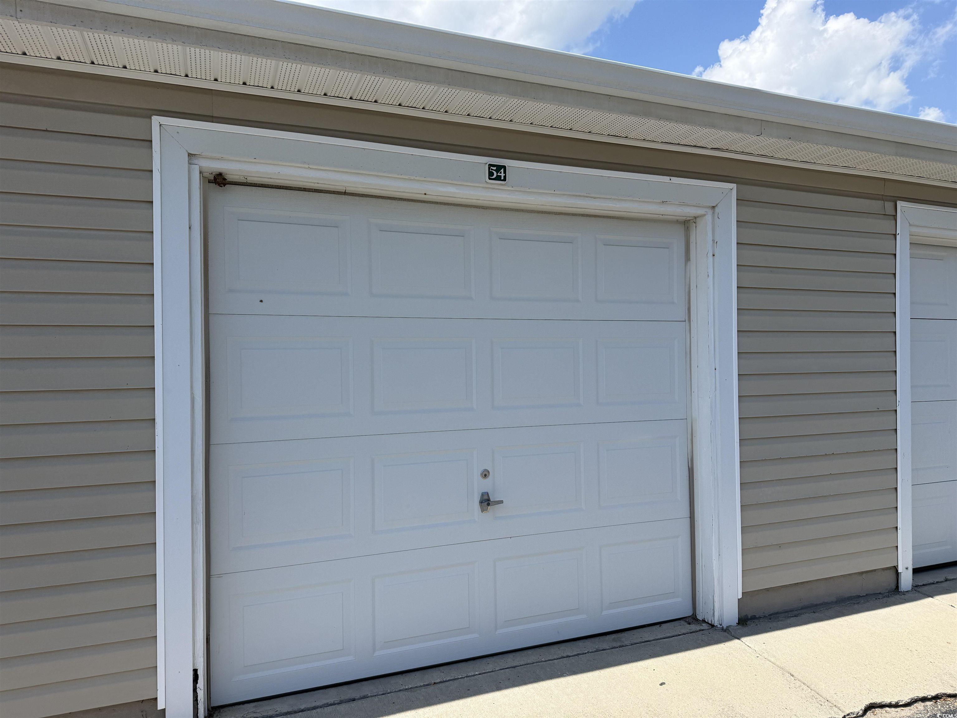 320 Kiskadee Loop, Unit 11B Conway, SC 29526 - Photo 40 of 40 View of garage