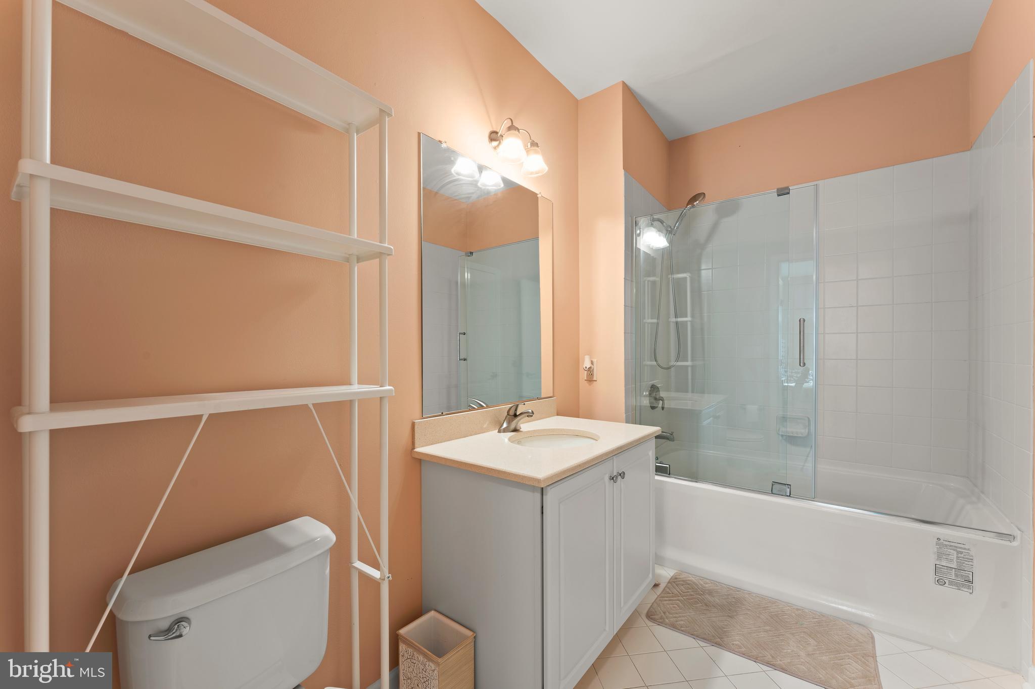 516 Carson Terrace Huntingdon Valley, PA 19006 - Photo 12 of 29 a bathroom with a granite countertop sink toilet and shower