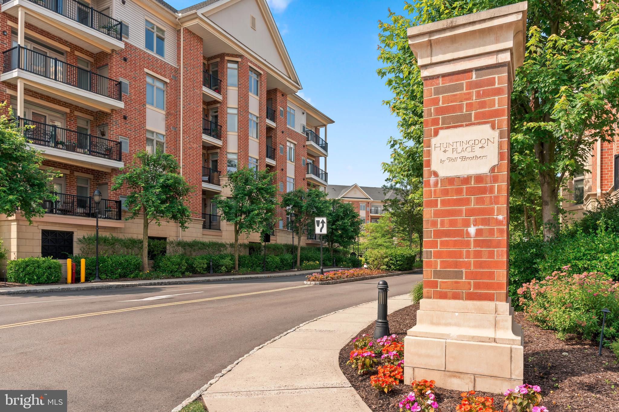 516 Carson Terrace Huntingdon Valley, PA 19006 - Photo 2 of 29 a front view of a building with plants