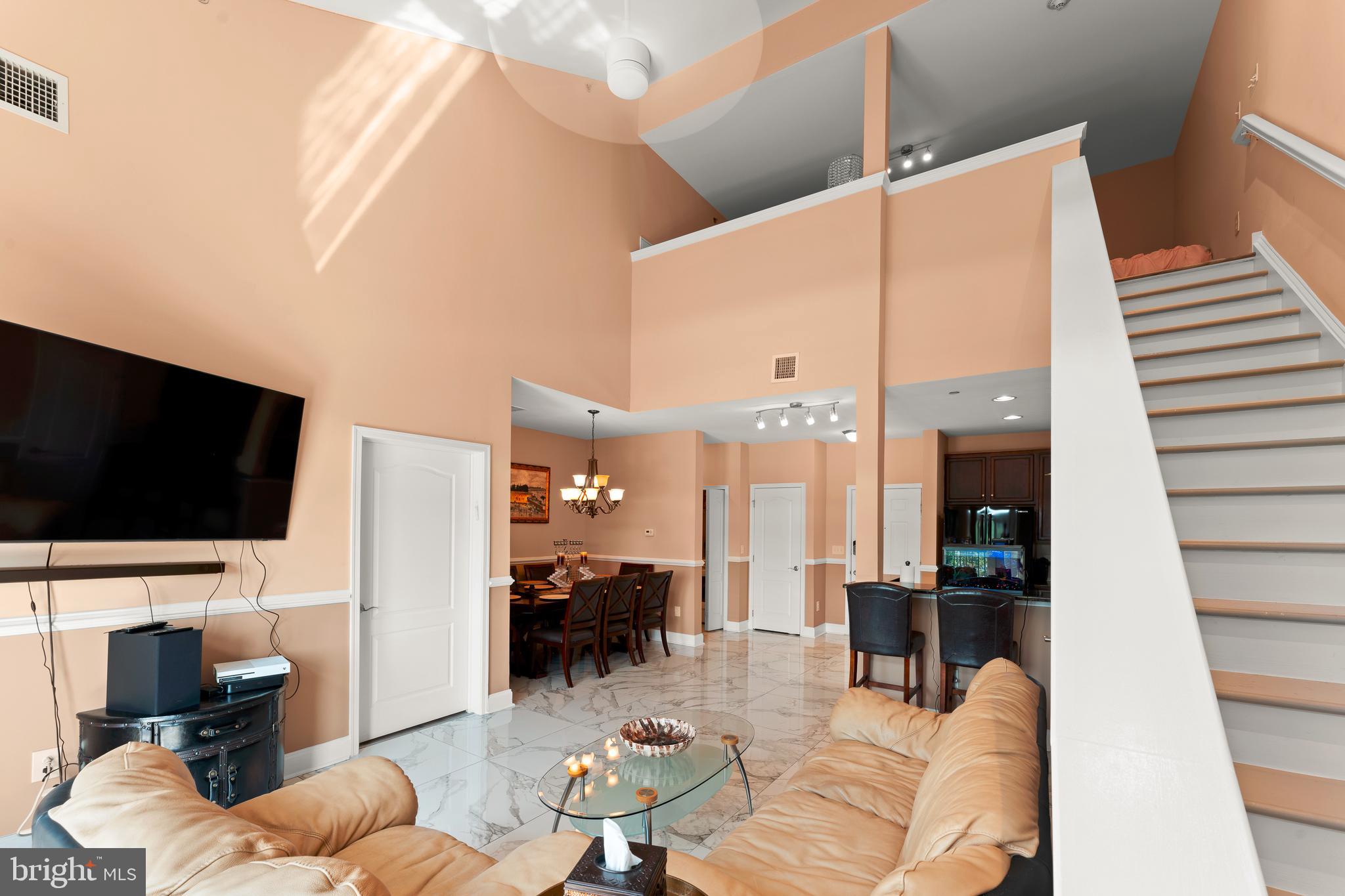 516 Carson Terrace Huntingdon Valley, PA 19006 - Photo 3 of 29 a living room with furniture and a flat screen tv