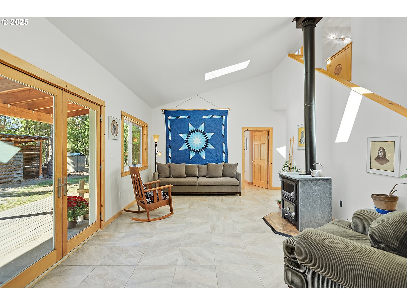 27 Whispering Pines Goldendale, WA 98620 - Photo 13 of 41 a living room with furniture and a floor to ceiling window
