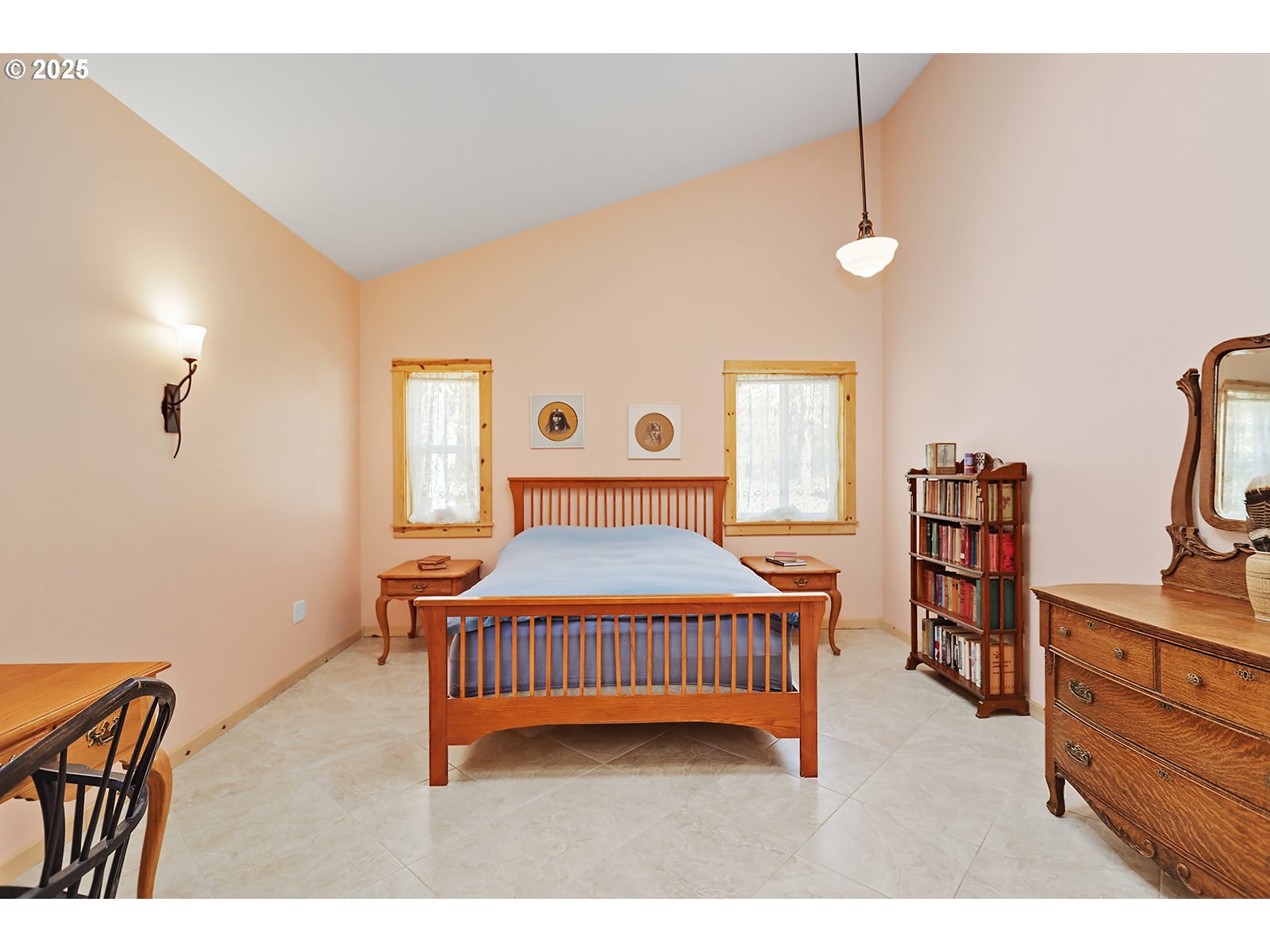 27 Whispering Pines Goldendale, WA 98620 - Photo 18 of 41 a bedroom with a bed and a book shelf