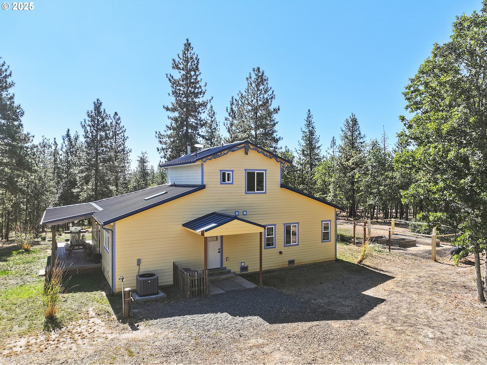 27 Whispering Pines Goldendale, WA 98620 - Photo 32 of 41 a view of a white house with a yard